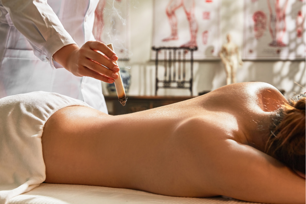 Smokeless moxibustion therapy warming acupuncture points